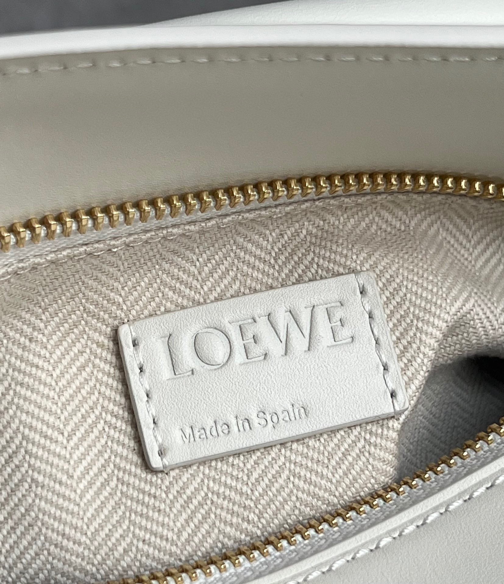 L0ew* puzzle edge small bag in white satin calfskin