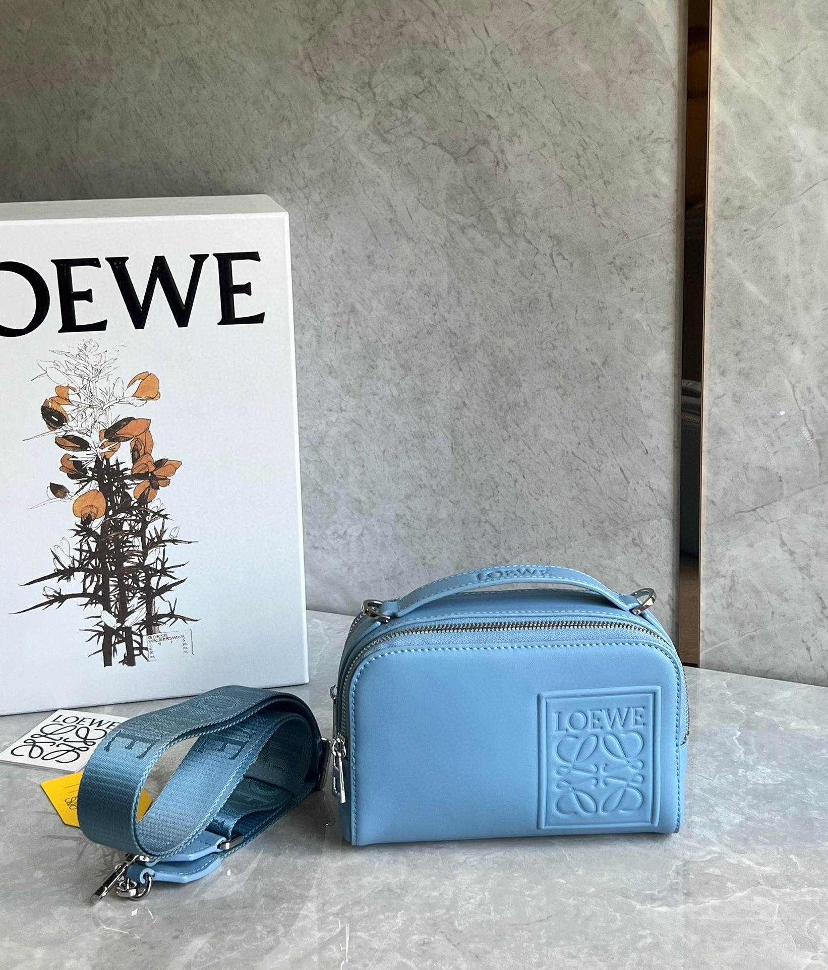 L0ew* mini camera crossbody bag in blue calfskin