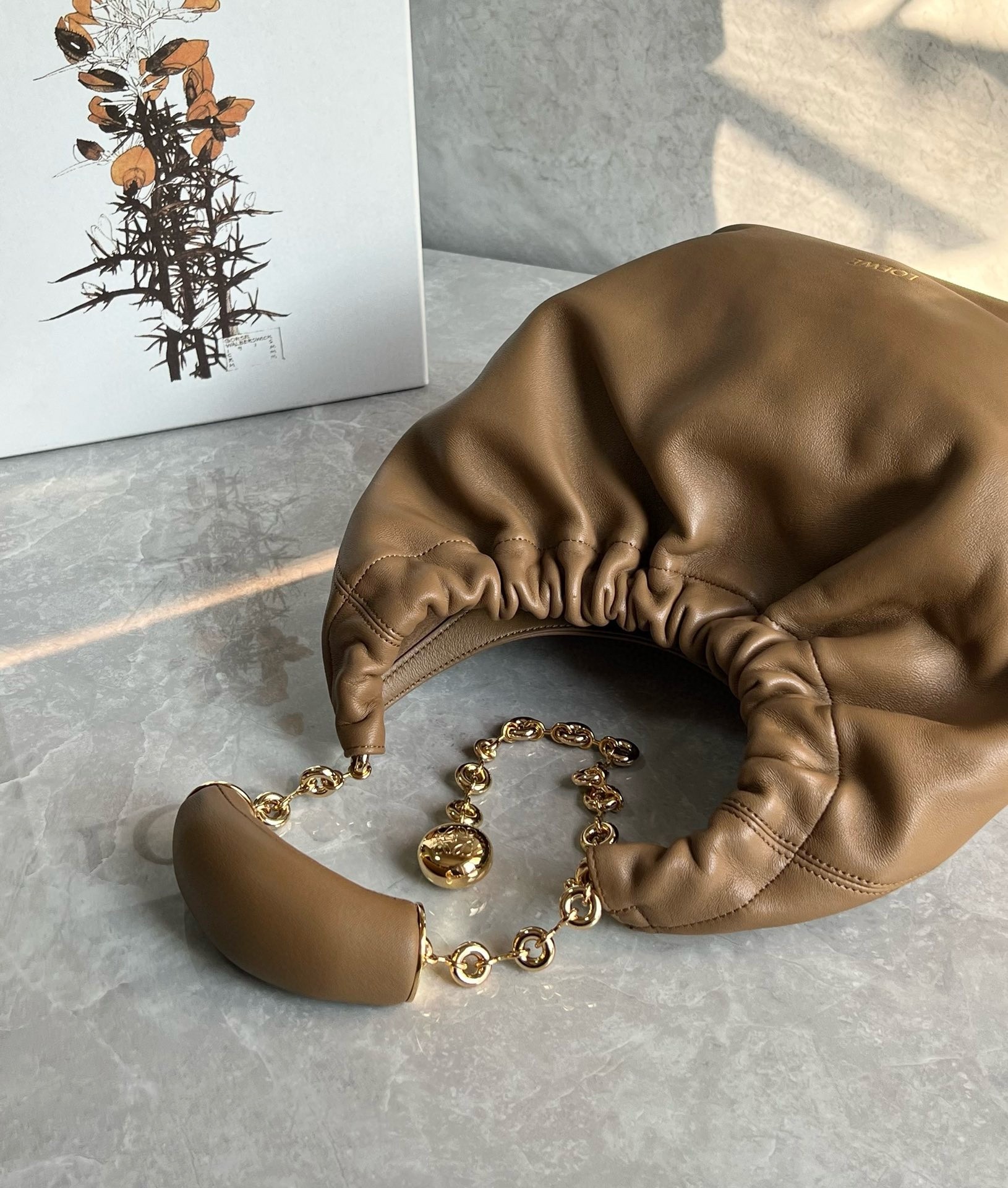 L0ew* small squeeze bag in brown nappa lambskin