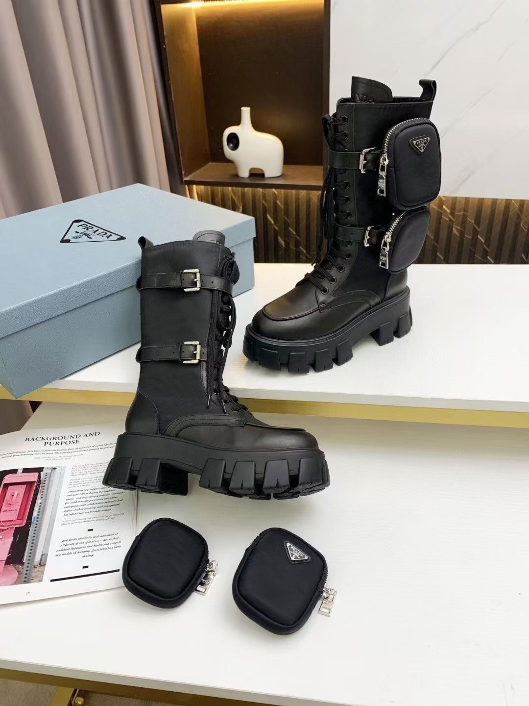 Pra*a monolith boots in noir leather and nylon fabric
