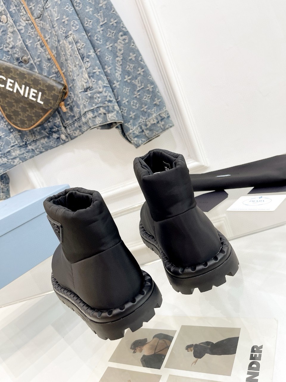 Pra*a booties in black nylon fabric