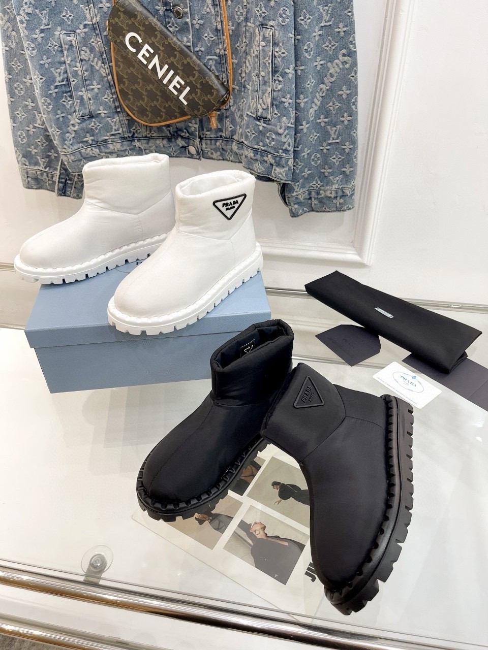 Pra*a booties in black nylon fabric