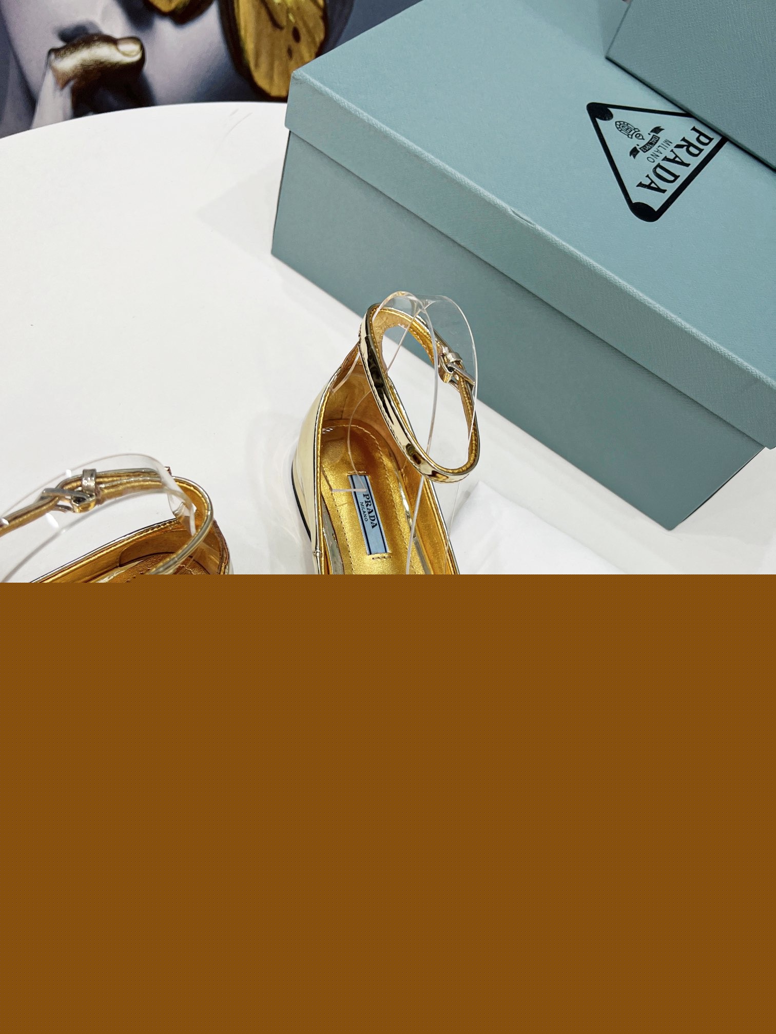 Pra*a ballerinas in gold metallic leather