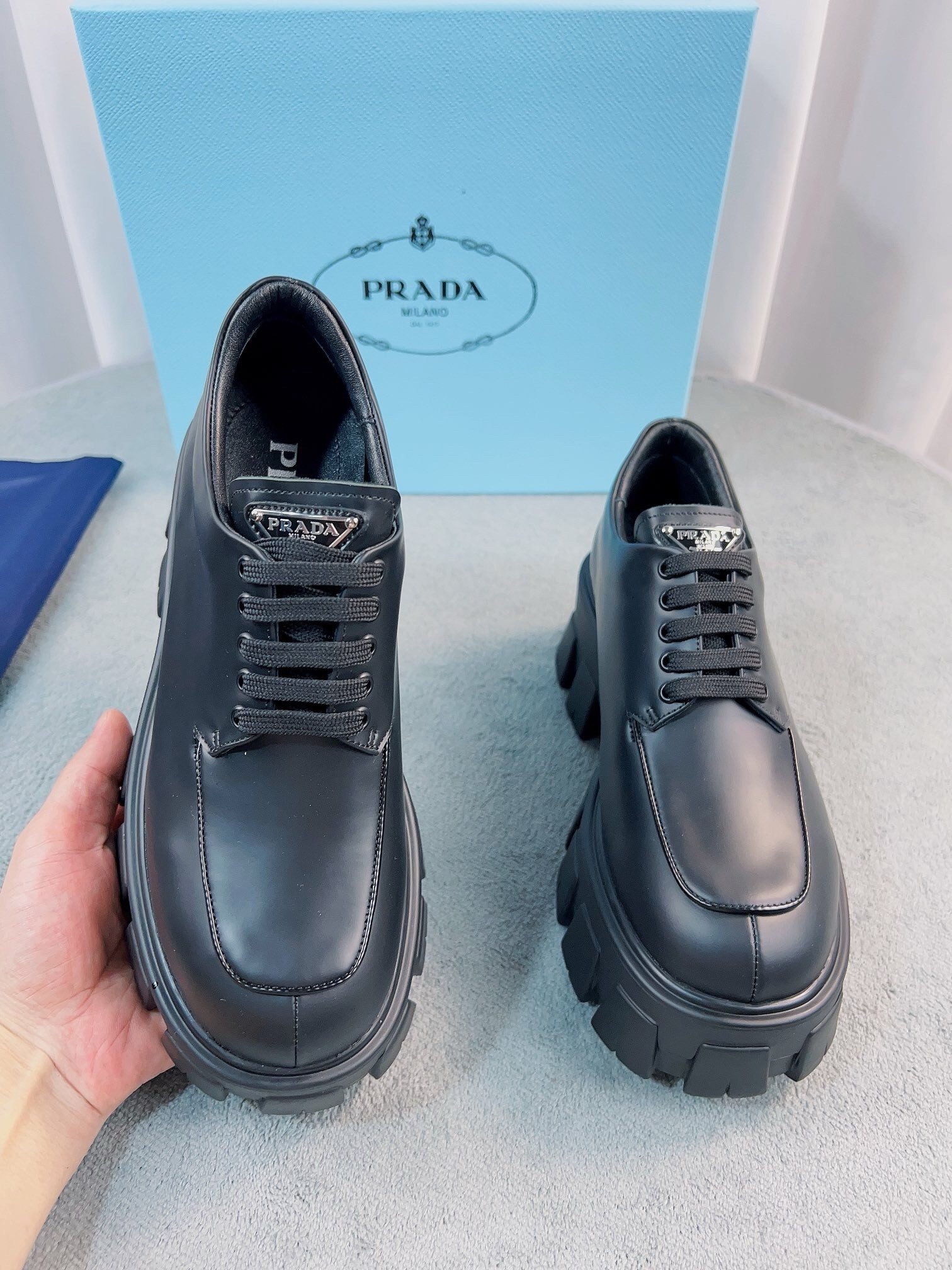 Pra*a monolith lace-up shoes in black brushed leather