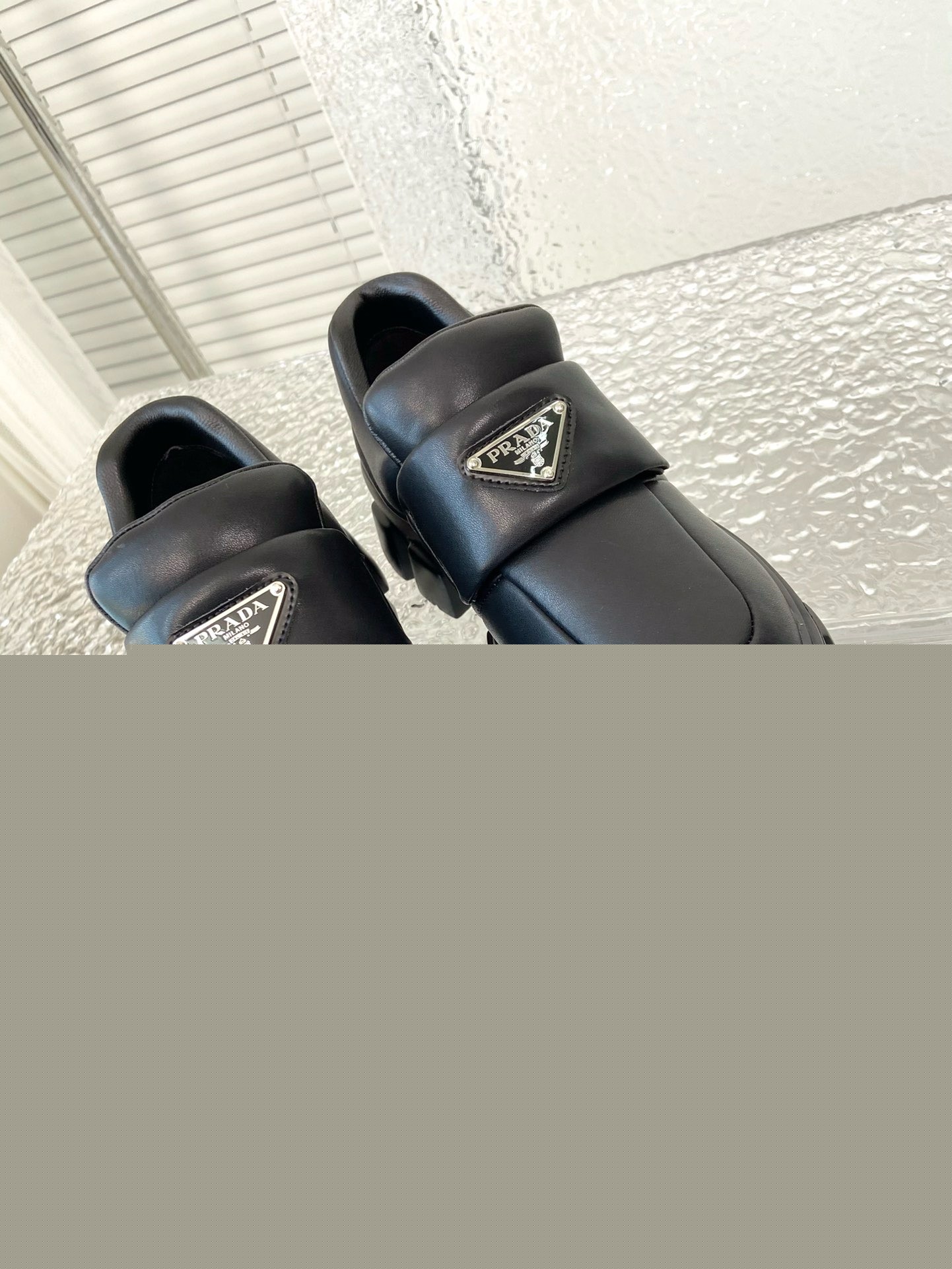 Pra*a loafers in black soft padded nappa leather