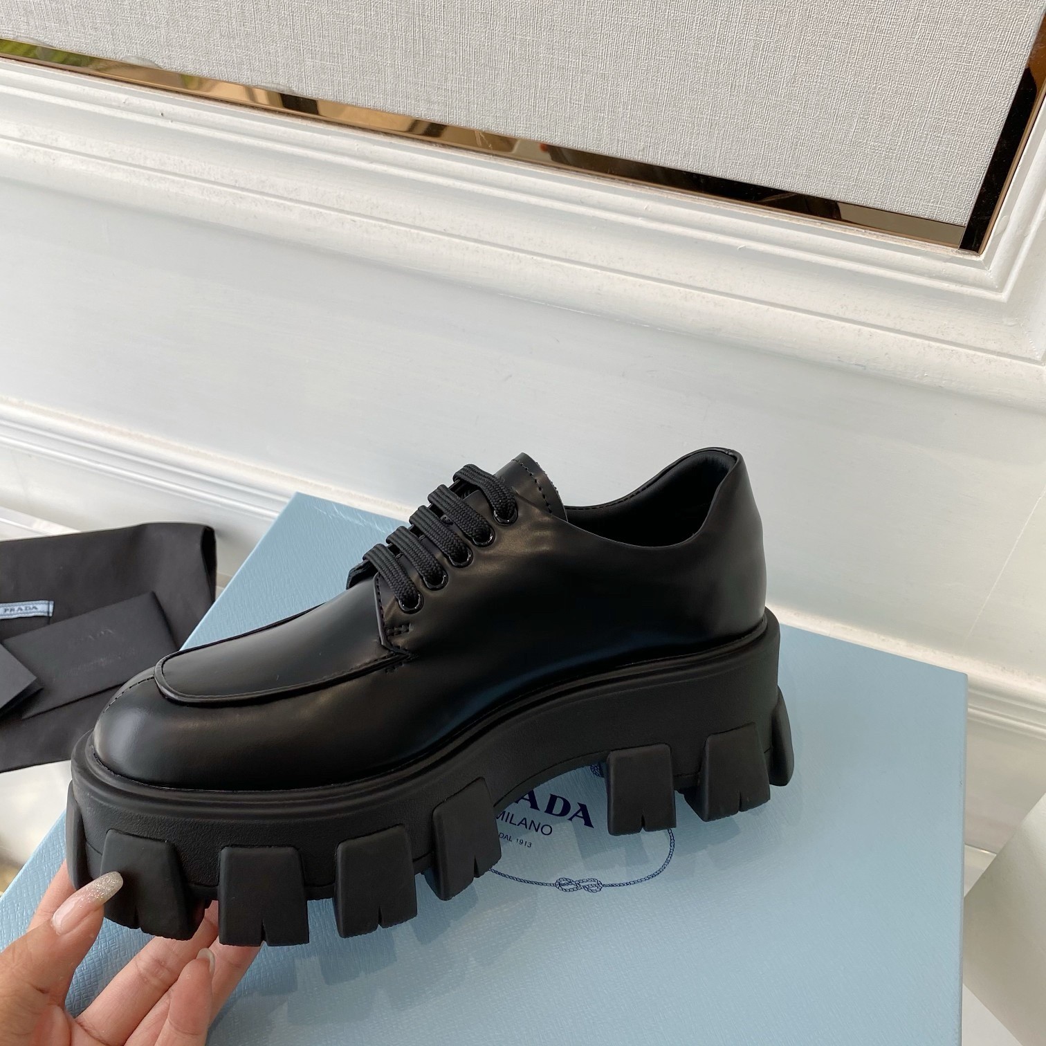 Pra*a monolith lace-up loafers in black brushed leather