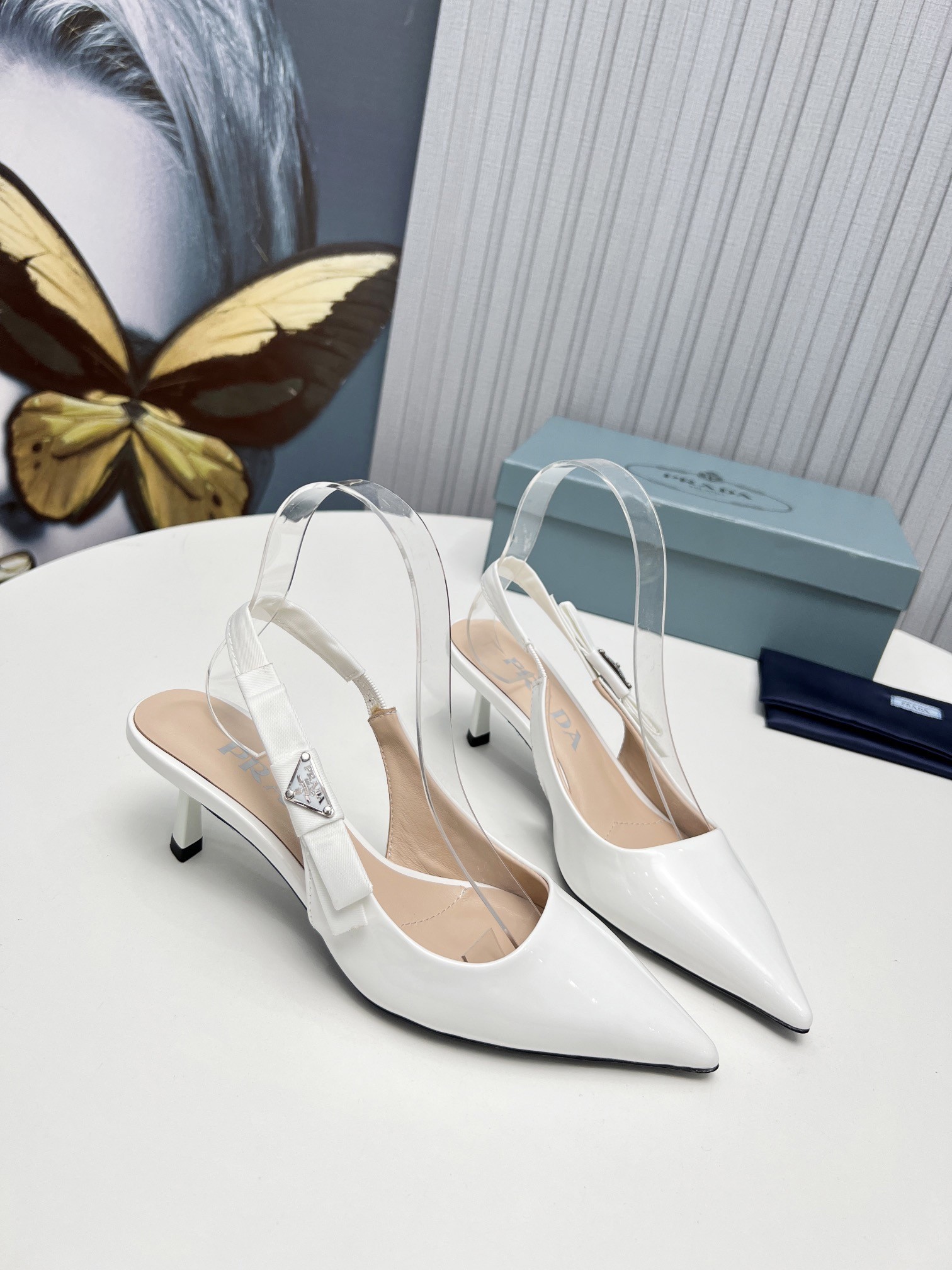 Pra*a slingbacks pumps 45mm in white patent leather
