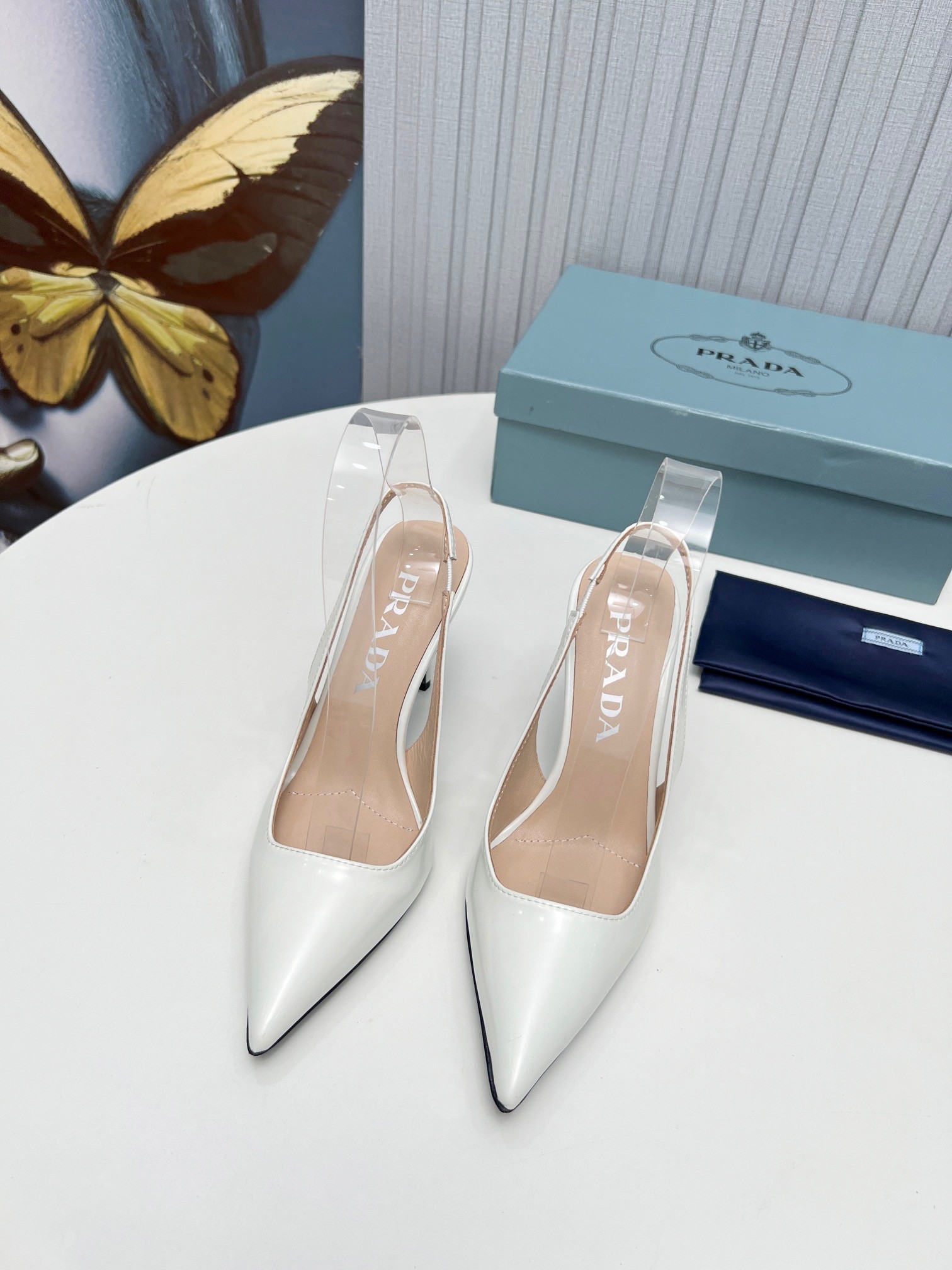 Pra*a slingbacks pumps 95mm in white patent leather
