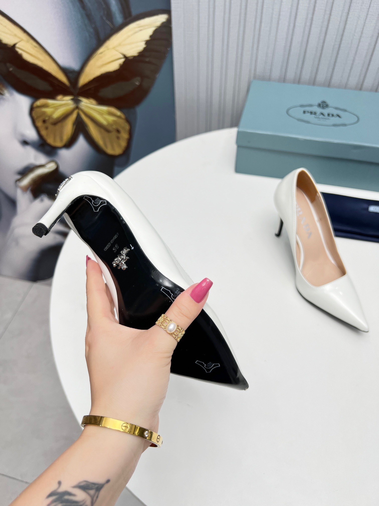 Pra*a pumps 95mm in white patent leather