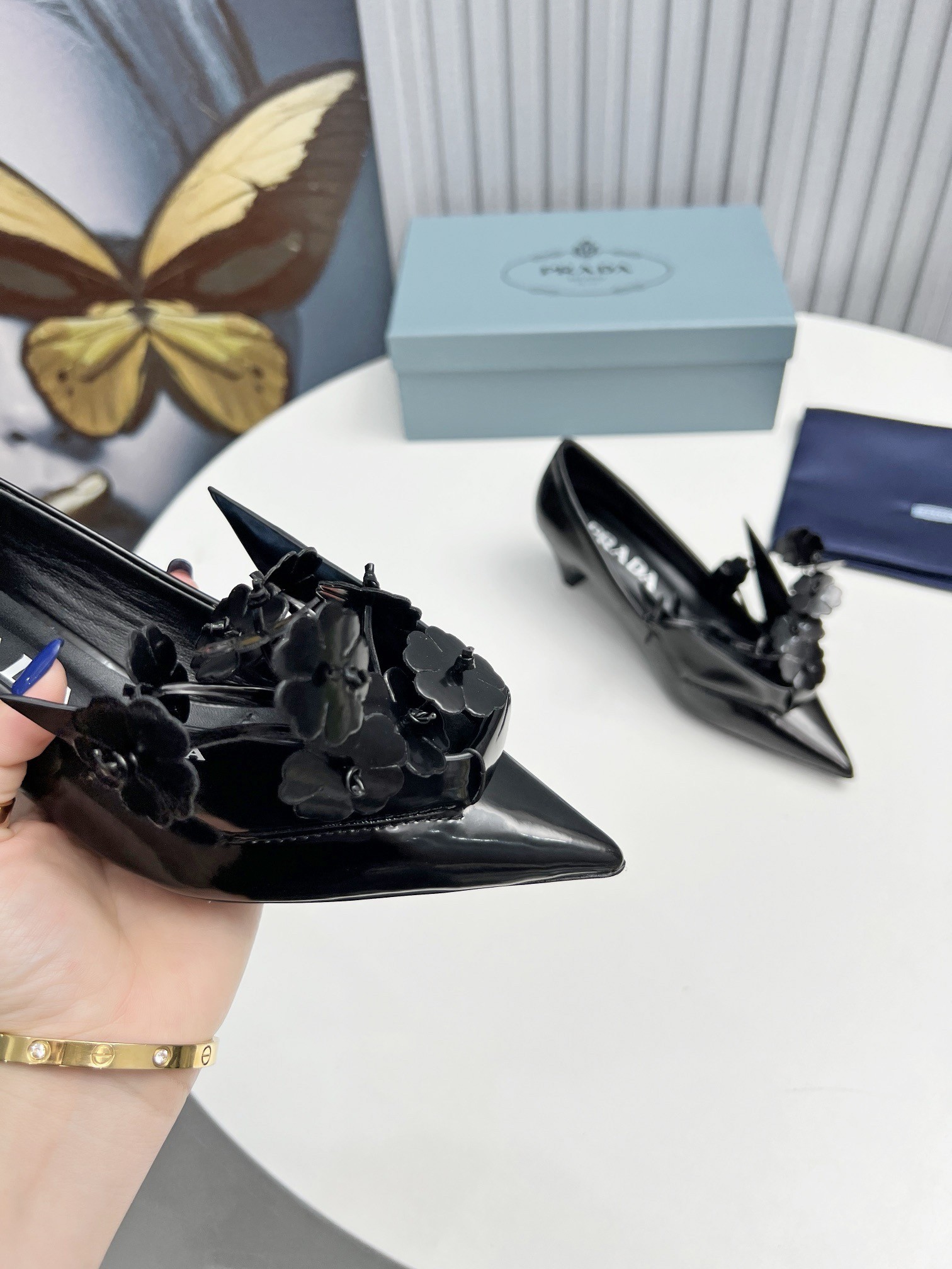 Pra*a pumps 45mm in black leather with floral appliques