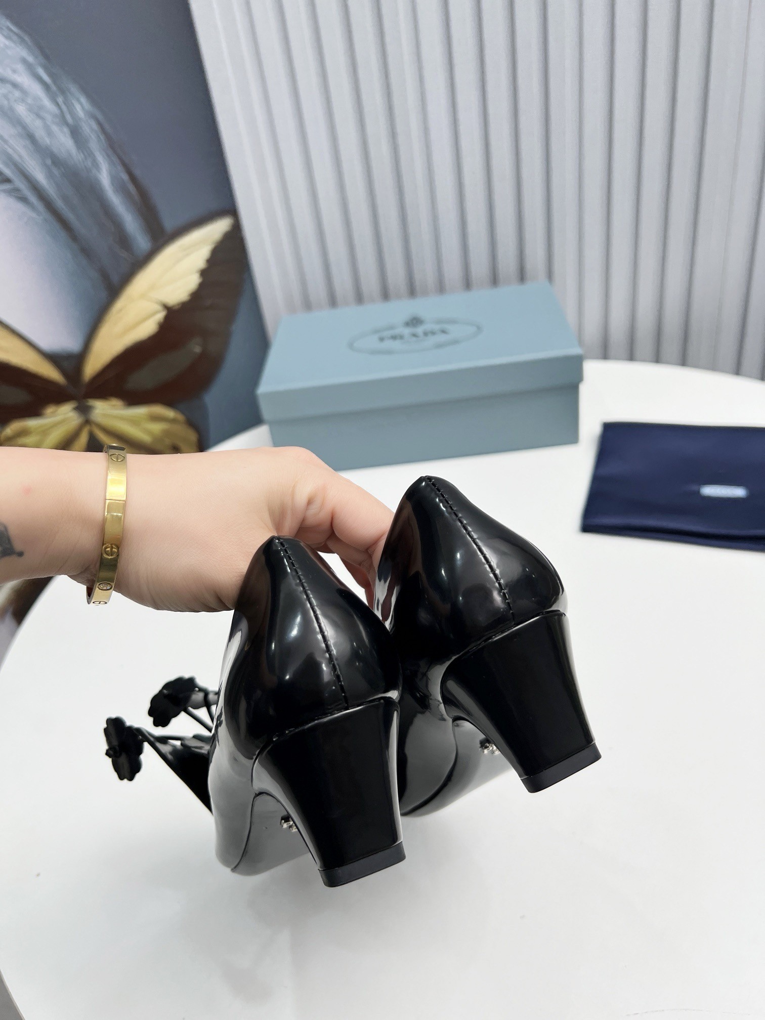 Pra*a pumps 45mm in black leather with floral appliques