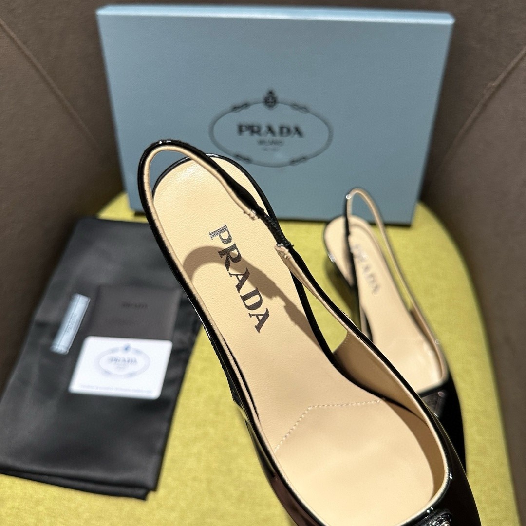 Pra*a slingback pumps 55mm in black patent leather