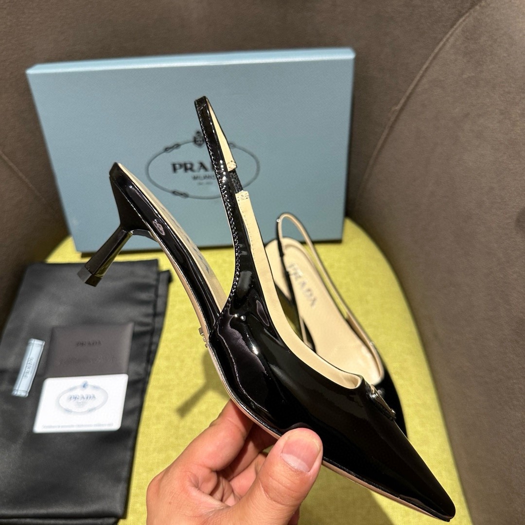 Pra*a slingback pumps 55mm in black patent leather