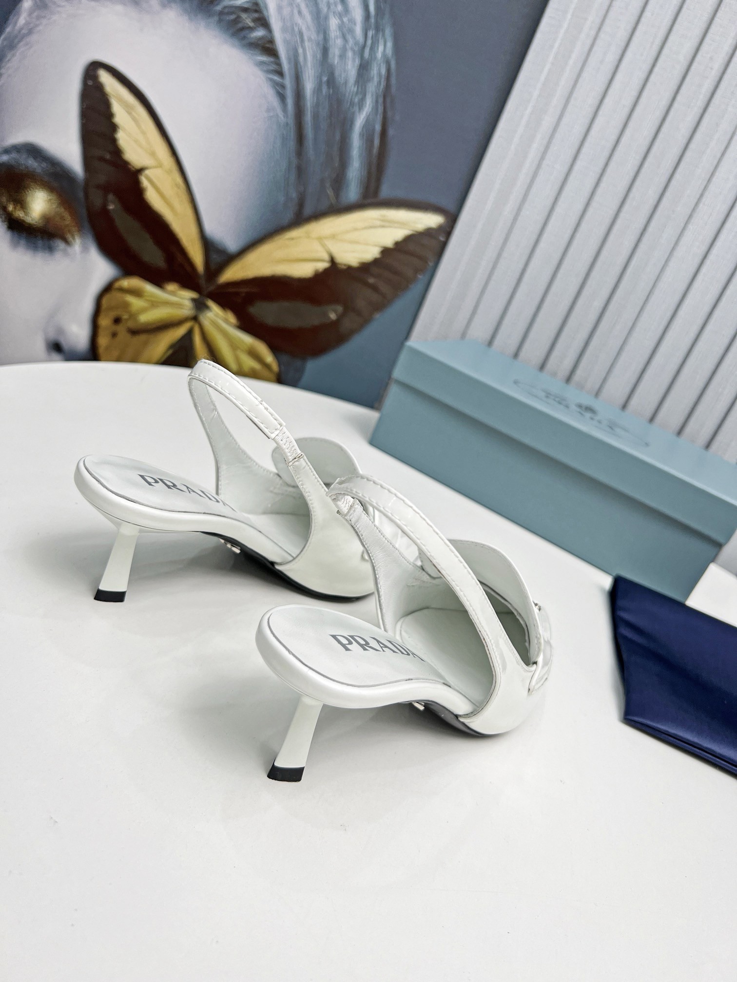 Pra*a slingback pumps 45mm in white patent calfskin