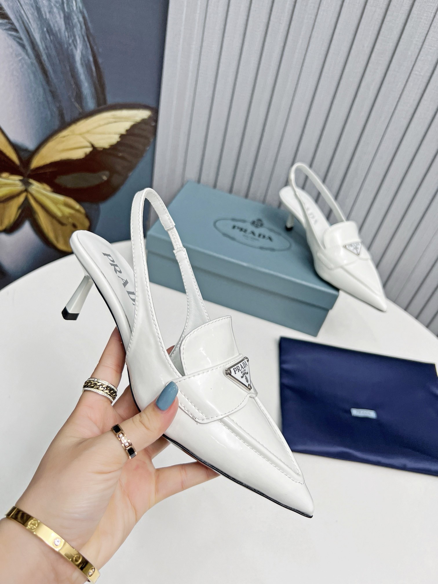 Pra*a slingback pumps 45mm in white patent calfskin
