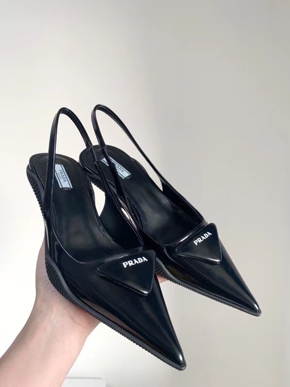 Pra*a slingback pumps in black brushed leather
