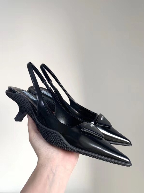 Pra*a slingback pumps in black brushed leather