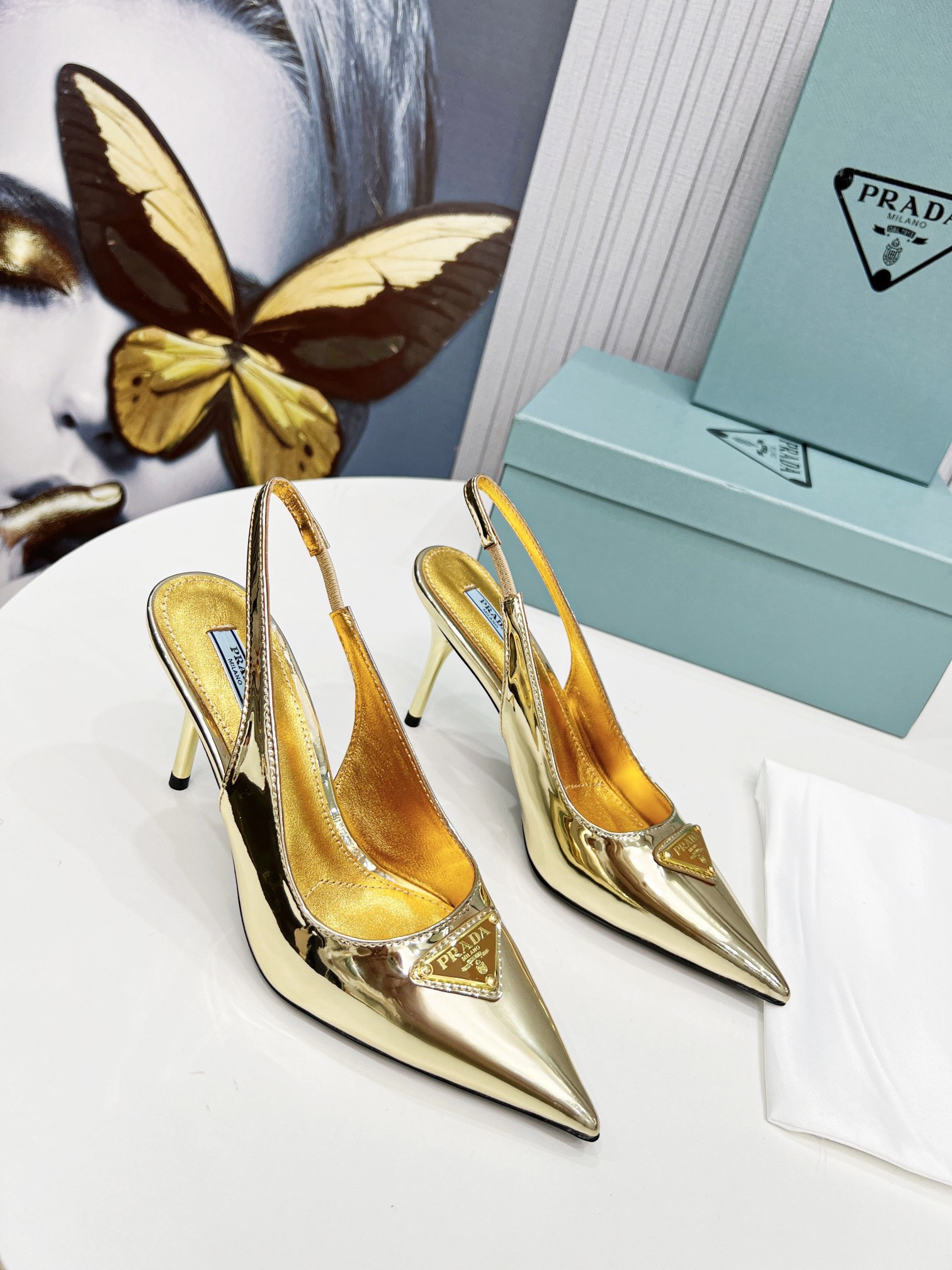 Pra*a slingbacks pumps 85mm in gold metallic leather