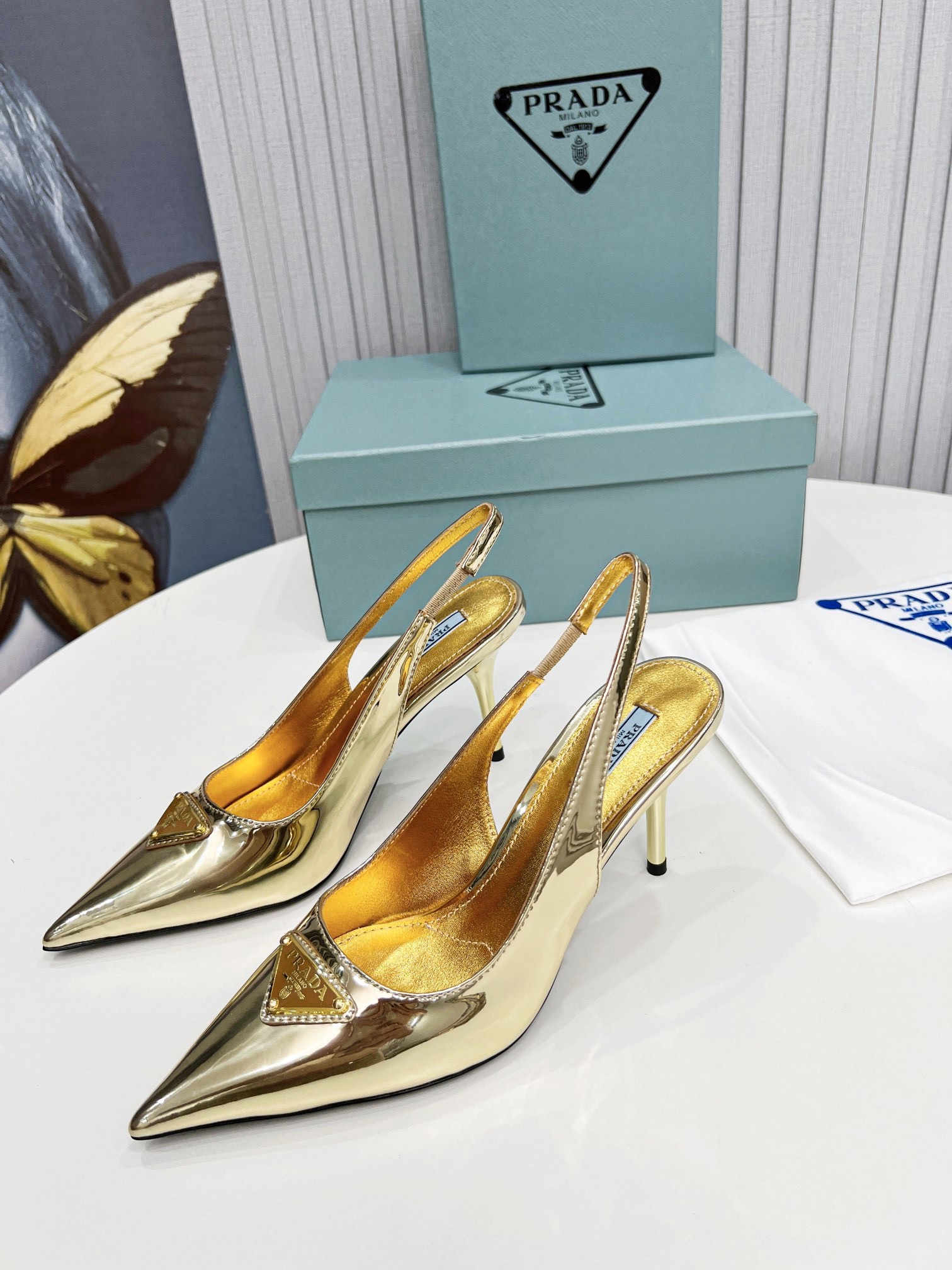Pra*a slingbacks pumps 85mm in gold metallic leather