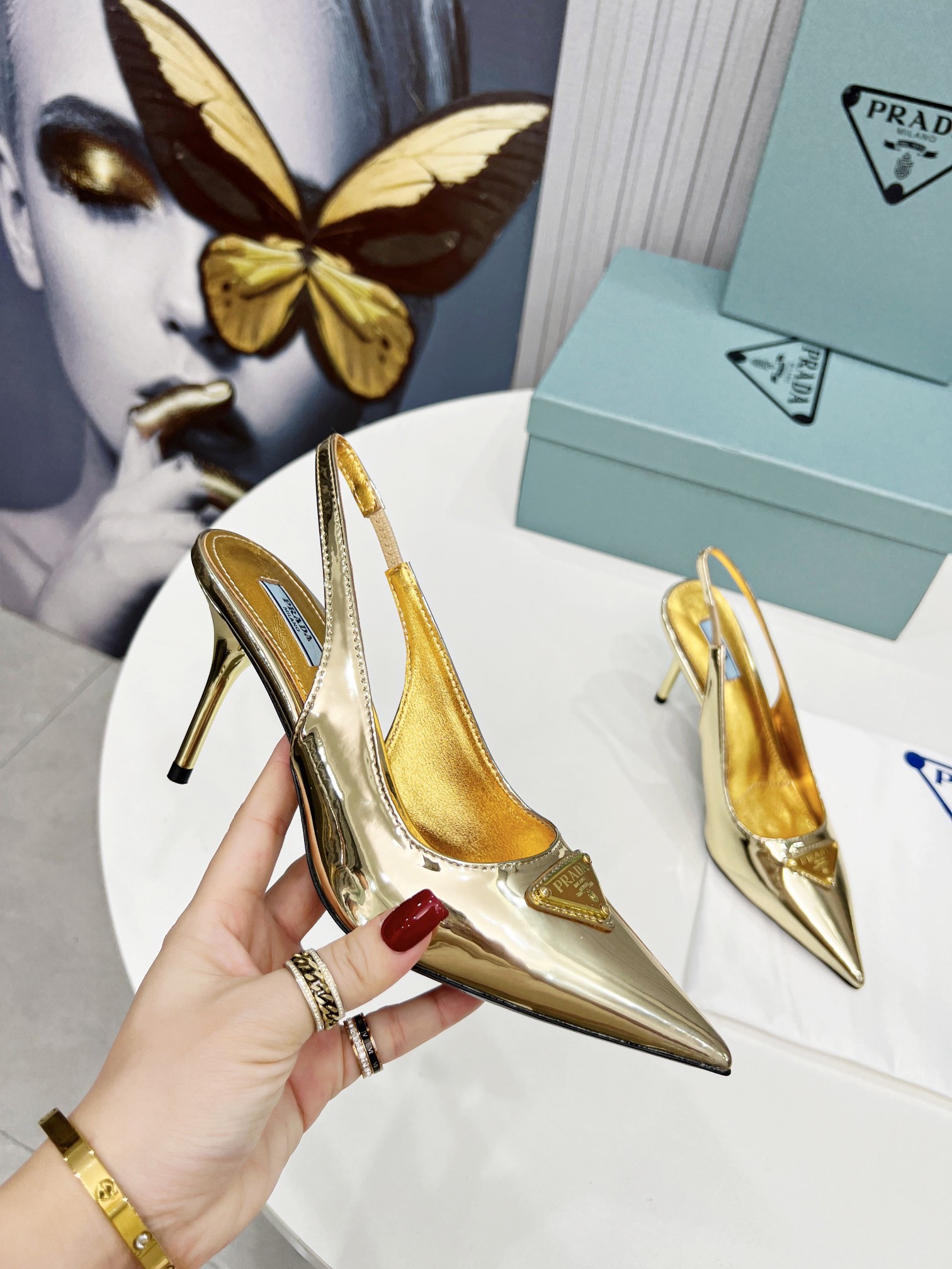 Pra*a slingbacks pumps 85mm in gold metallic leather