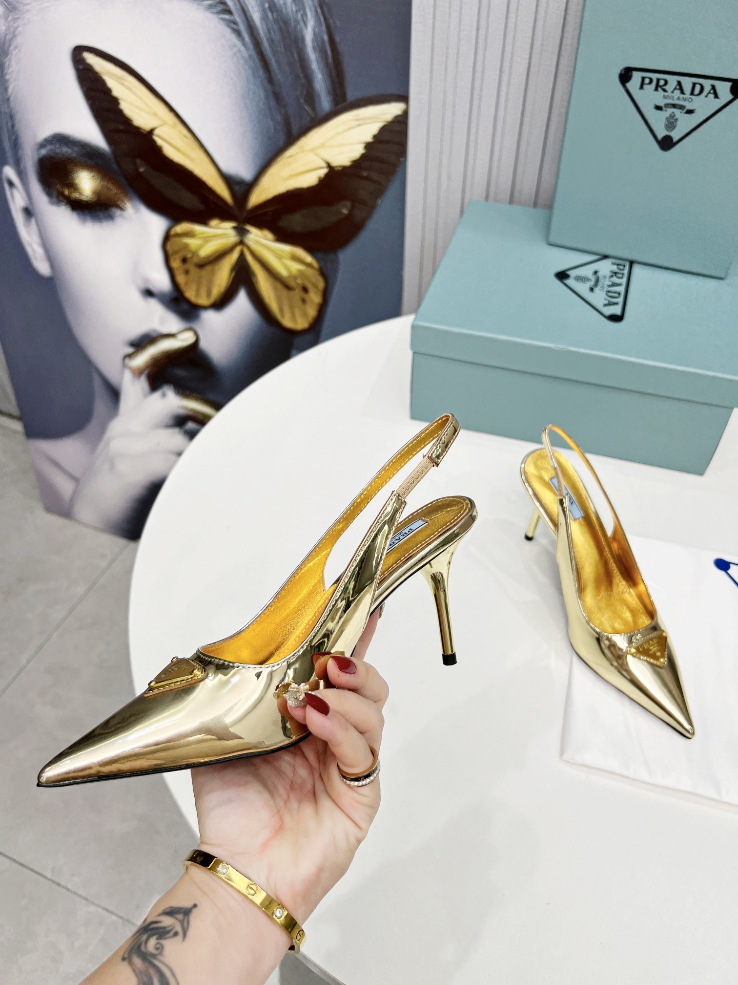 Pra*a slingbacks pumps 85mm in gold metallic leather
