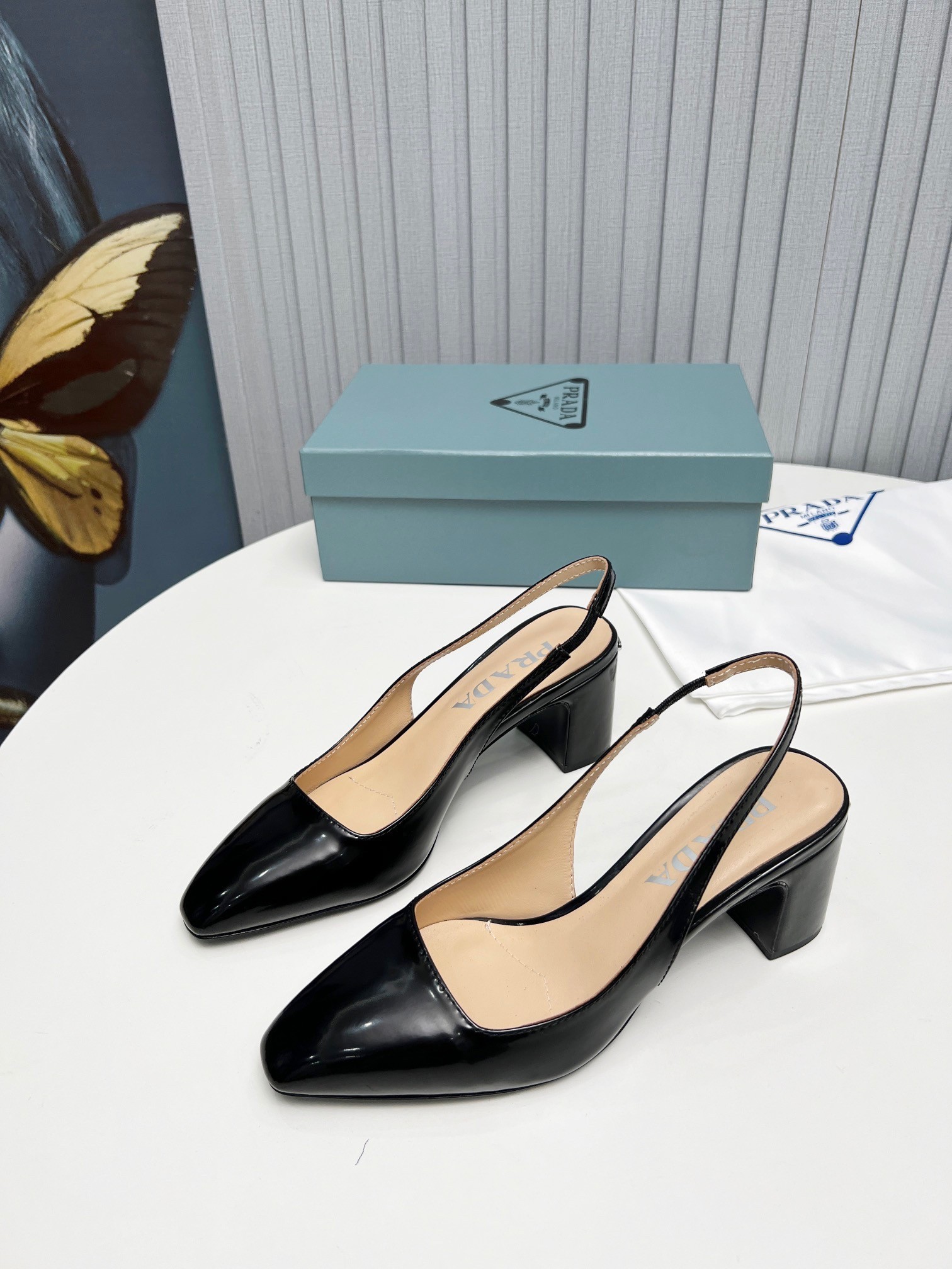 Pra*a slingbacks pumps 65mm in black patent leather