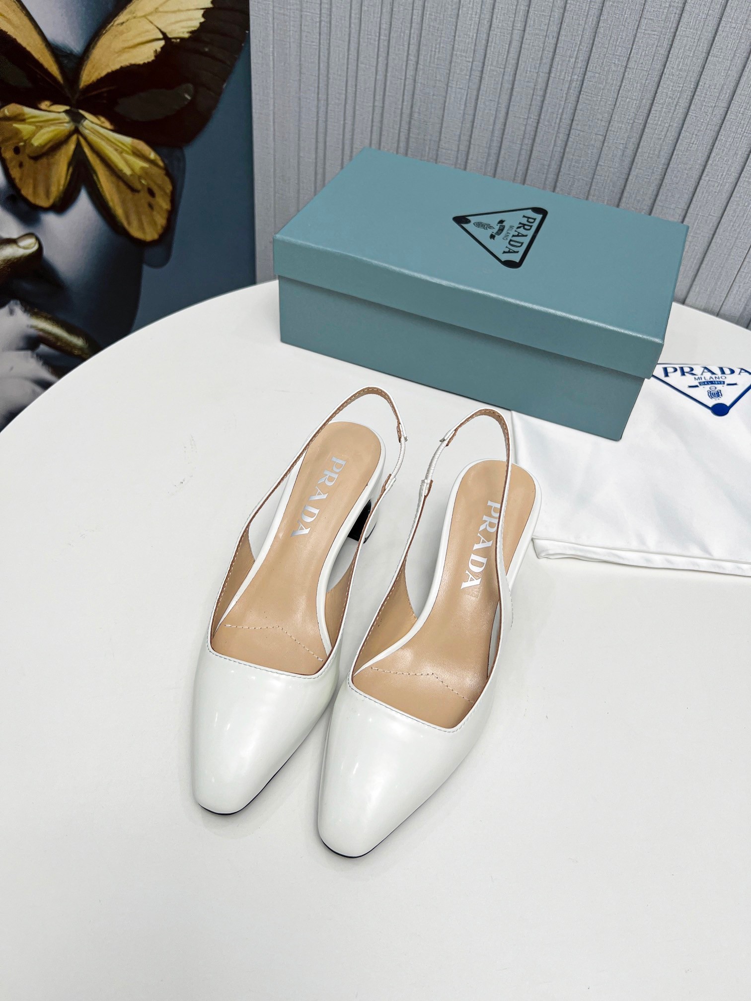 Pra*a slingbacks pumps 65mm in white patent leather