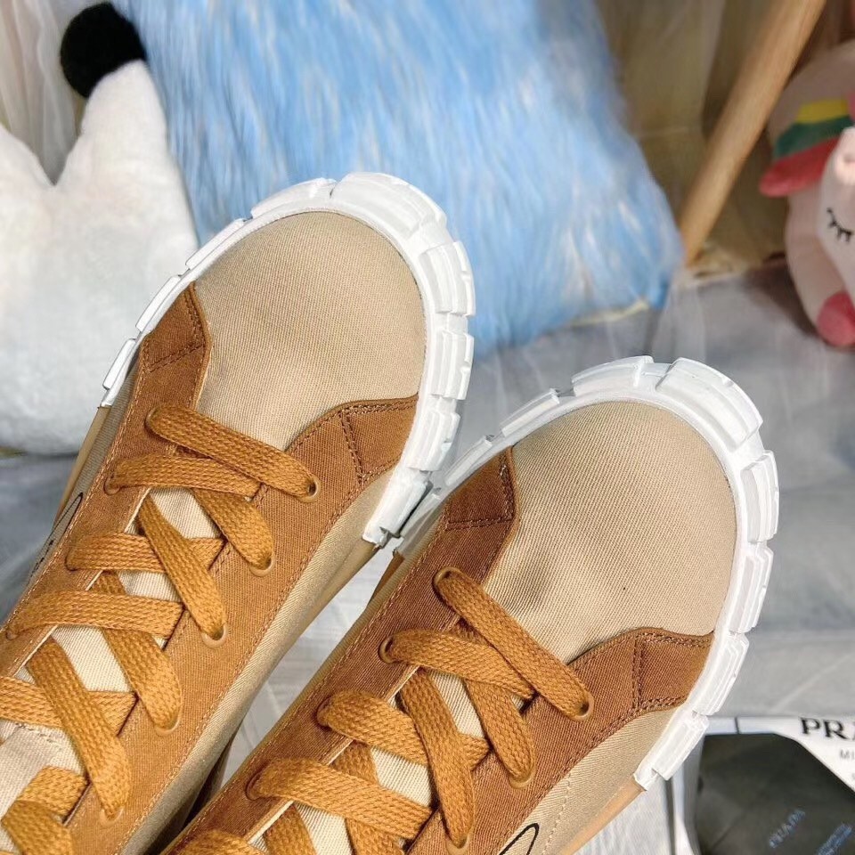 Pra*a beige/tan gabardine high-top sneakers