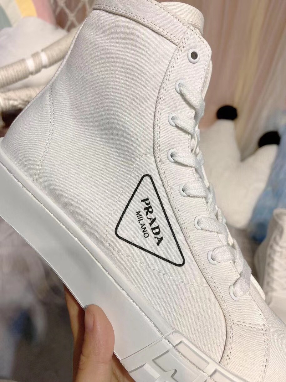 Pra*a white cotton canvas high-top sneakers