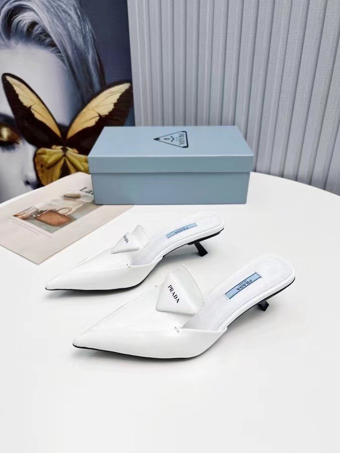 Pra*a sabots mules in white brushed leather