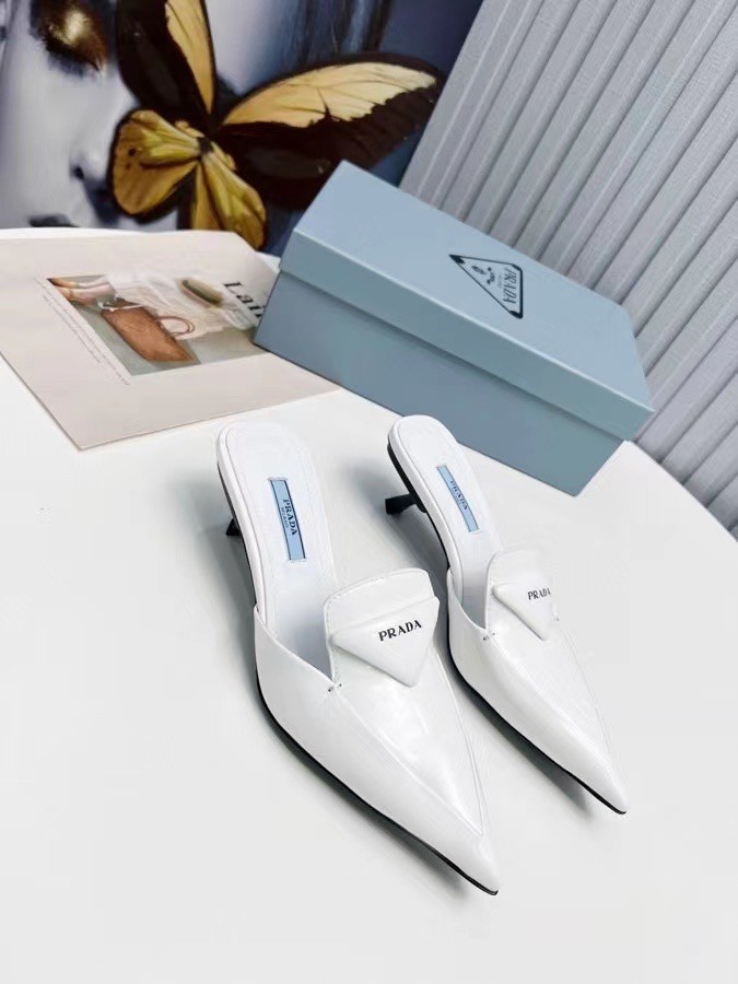 Pra*a sabots mules in white brushed leather