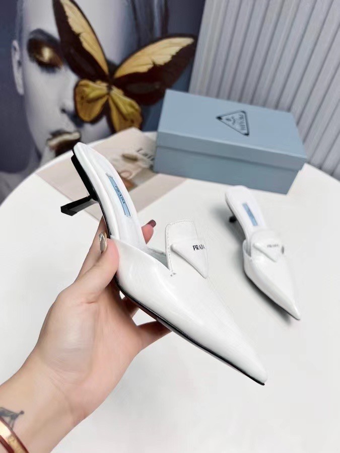 Pra*a sabots mules in white brushed leather