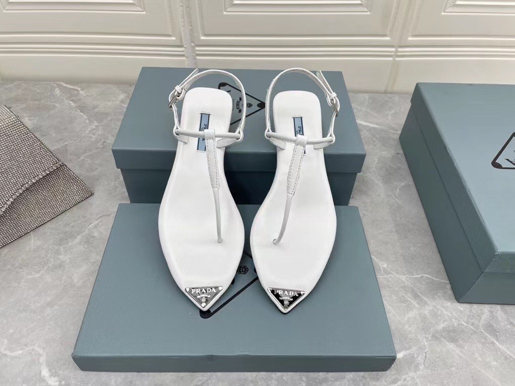 Pra*a thong sandals in white brushed leather