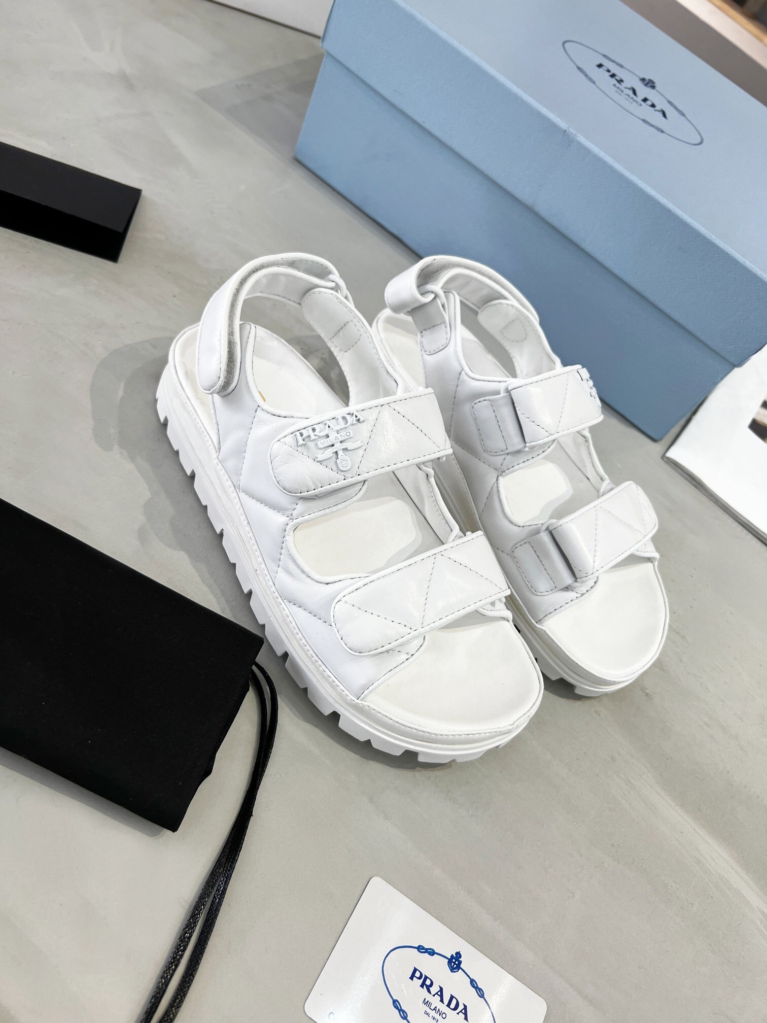 Pra*a padded sandals in white nappa leather