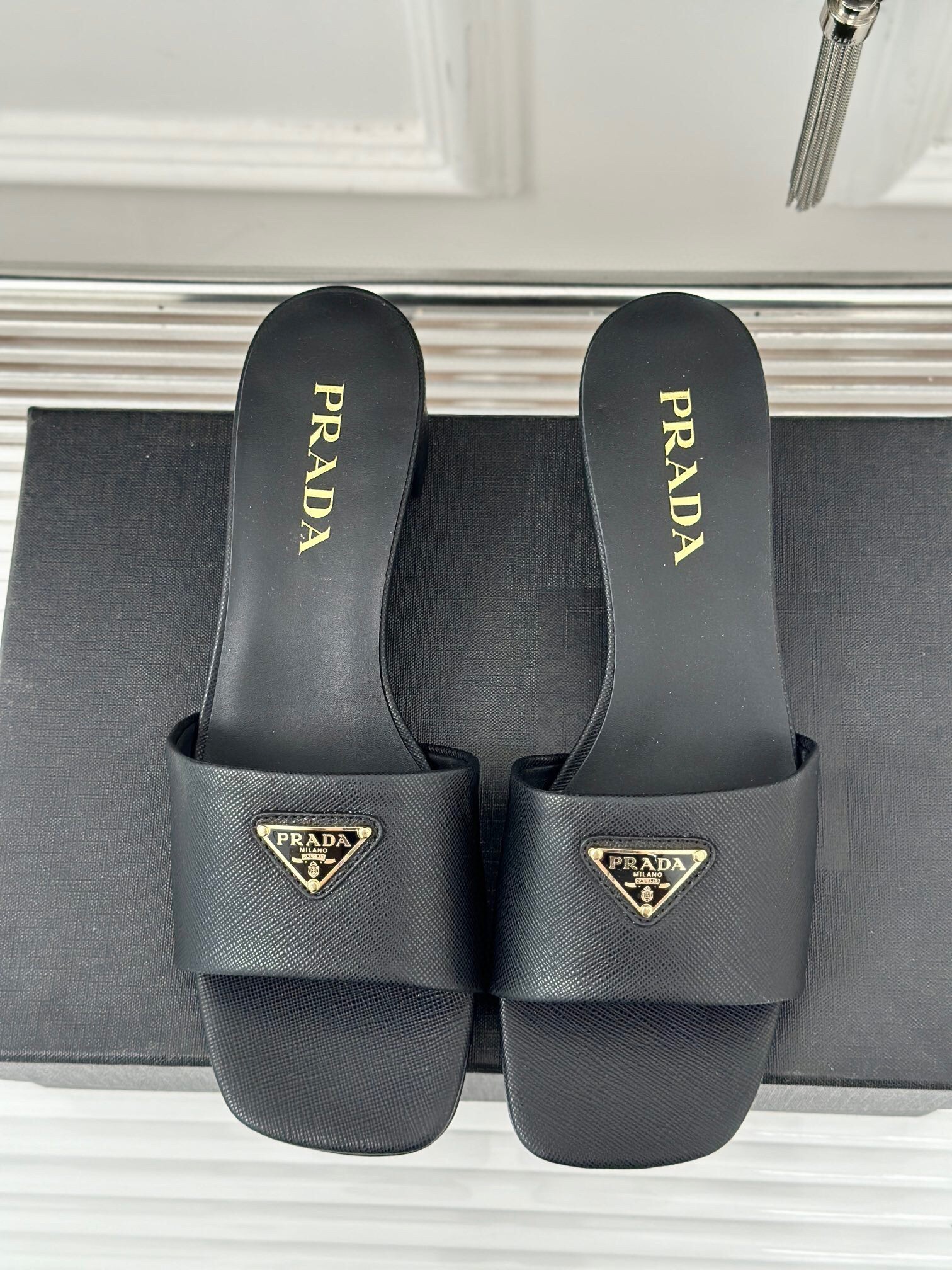 Pra*a heeled sandals 35mm in black saffiano leather