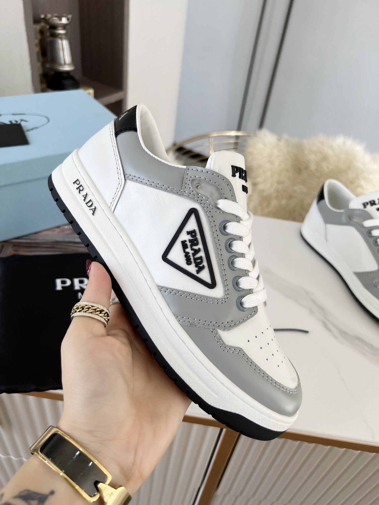 Pra*a district sneakers in white and grey calfskin