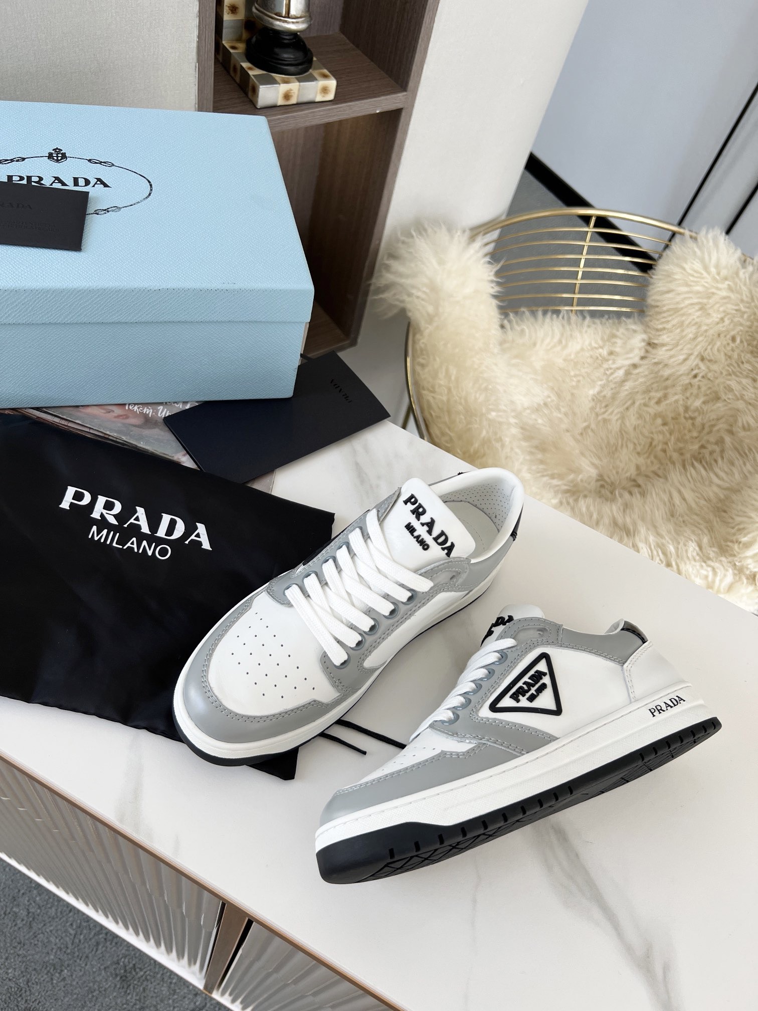 Pra*a district sneakers in white and grey calfskin