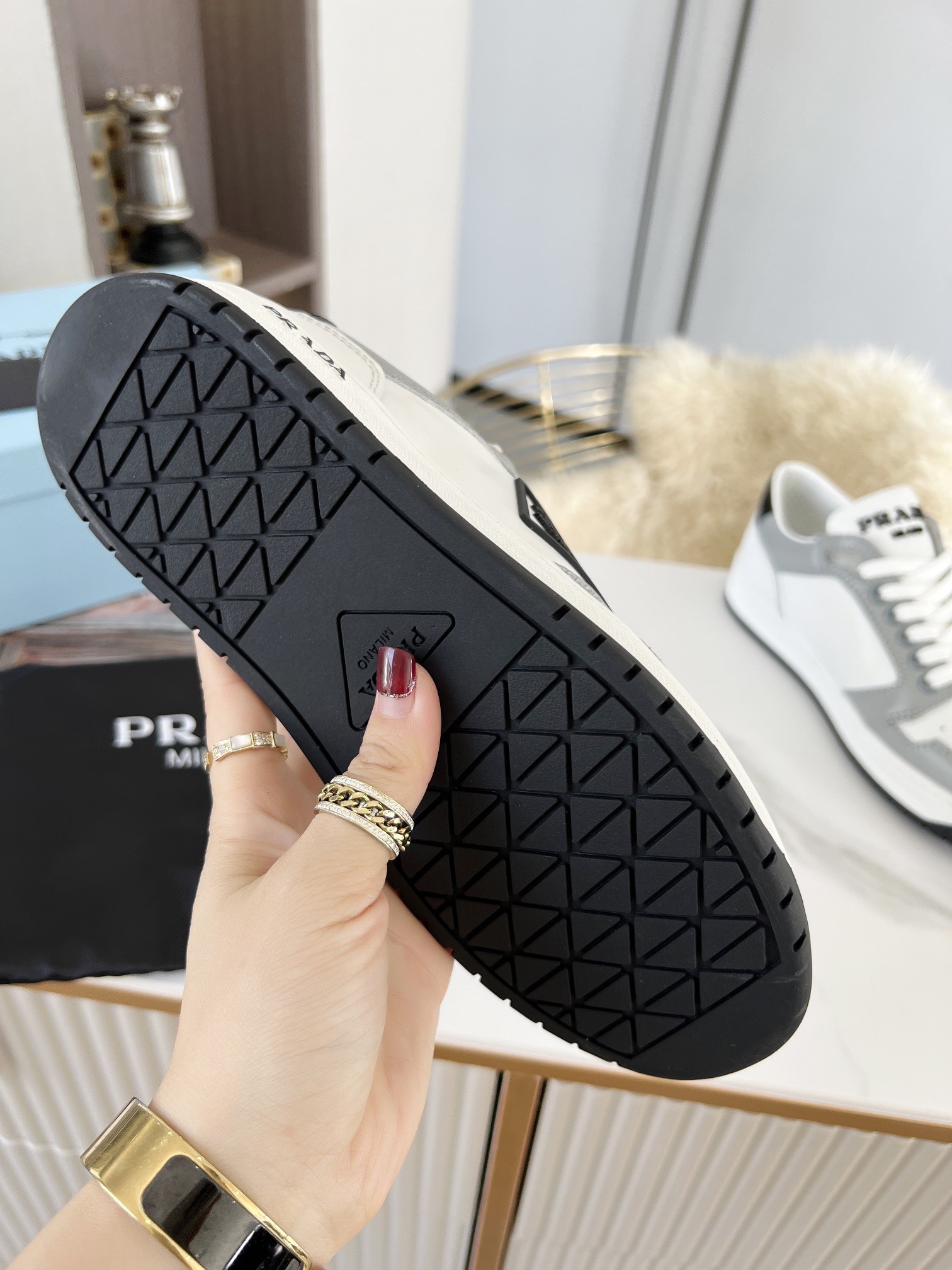 Pra*a district sneakers in white and grey calfskin