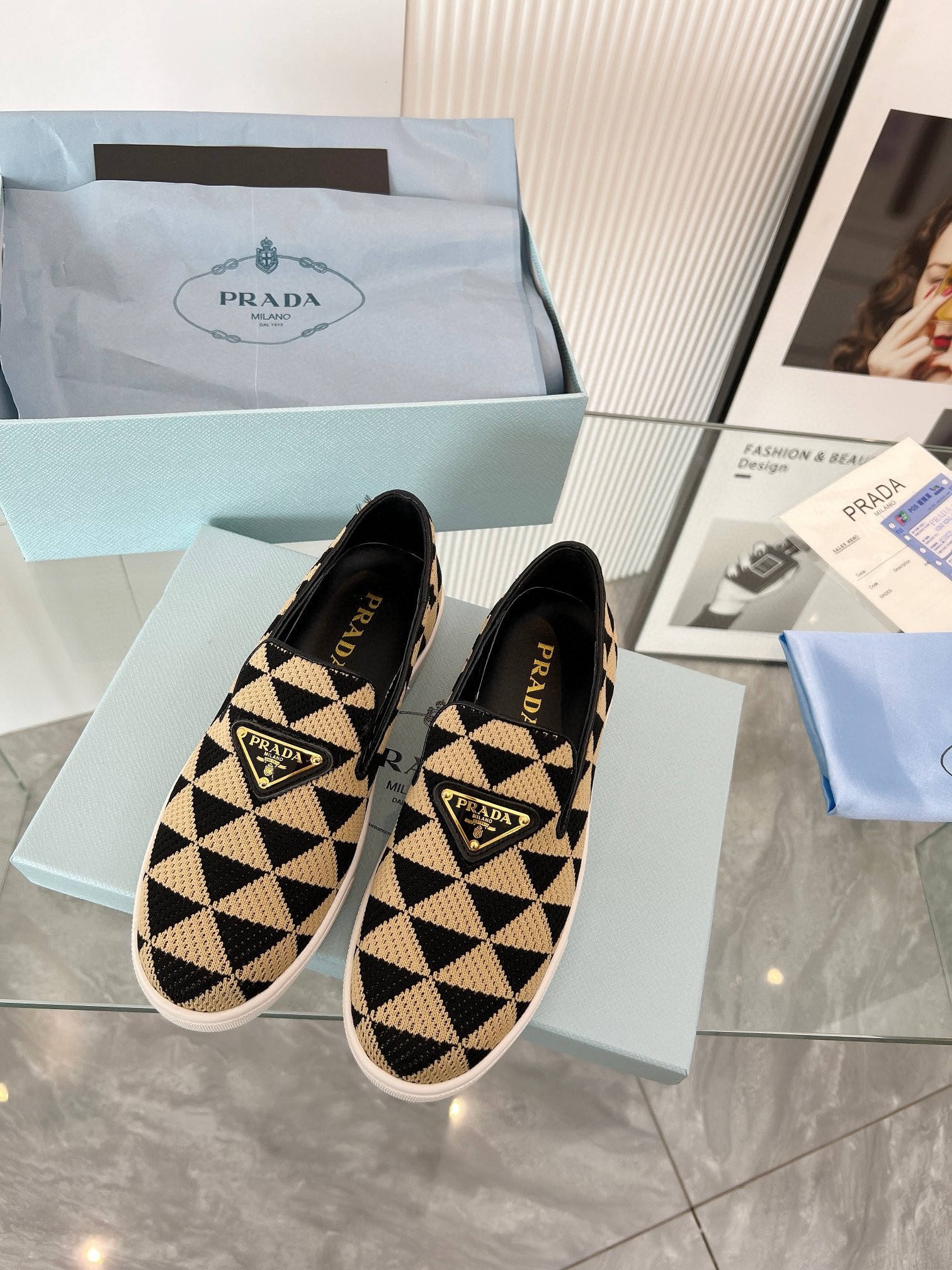 Pra*a slip-on sneakers in black/beige embroidered fabric