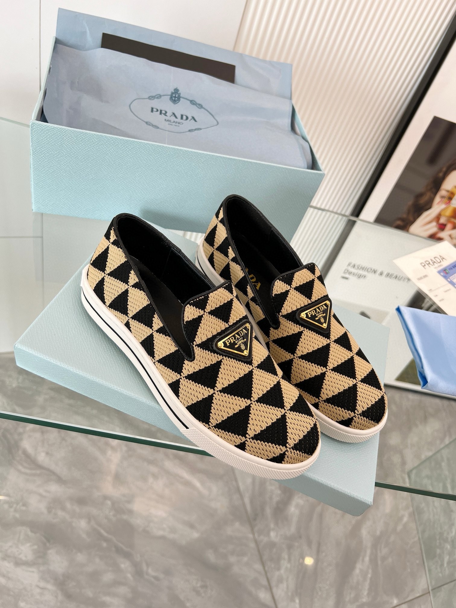 Pra*a slip-on sneakers in black/beige embroidered fabric
