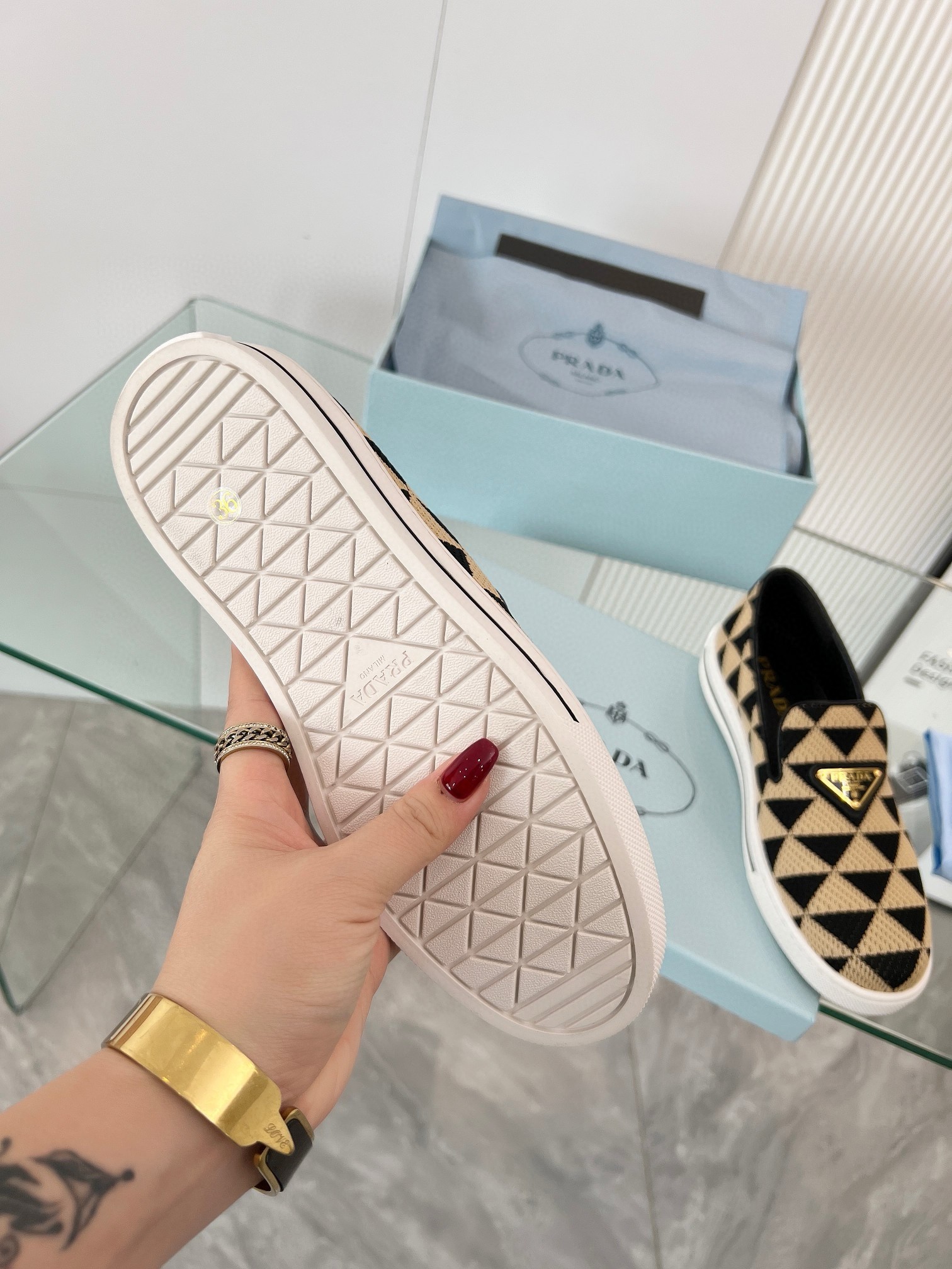 Pra*a slip-on sneakers in black/beige embroidered fabric
