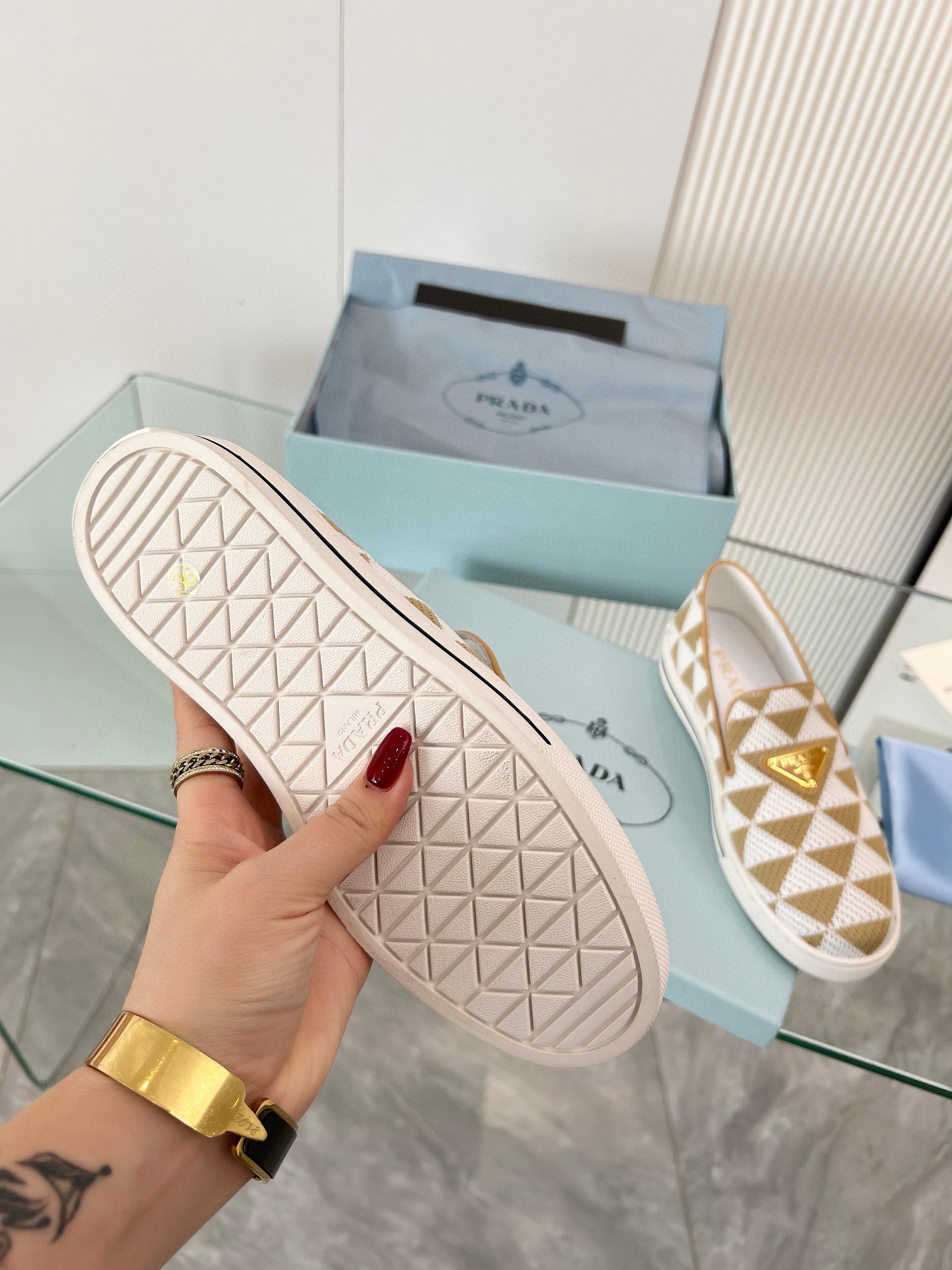 Pra*a slip-on sneakers in white/beige embroidered fabric