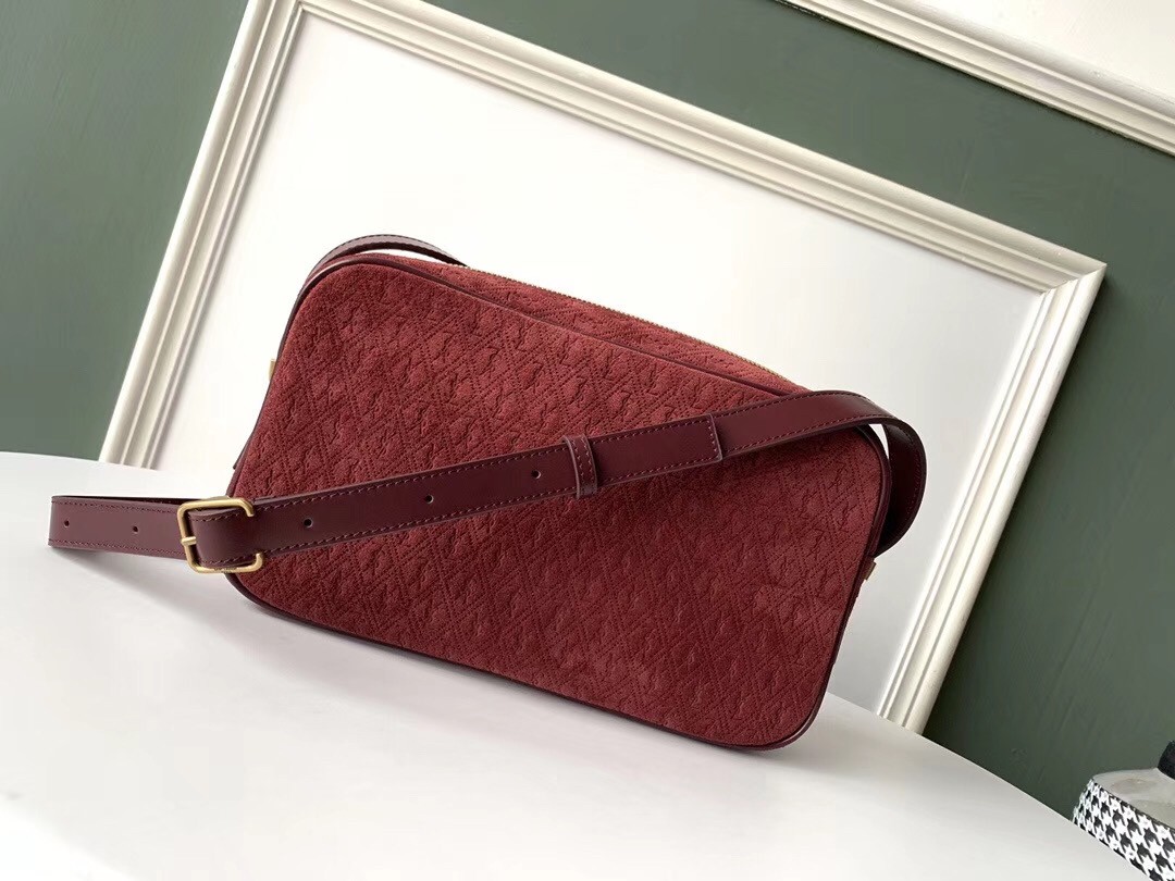 Sa**t Lau*nt monogram all over camera bag in bordeaux suede
