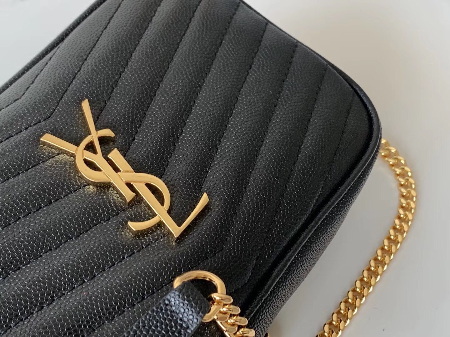 Sa**t Lau*nt lou mini bag in black grained leather
