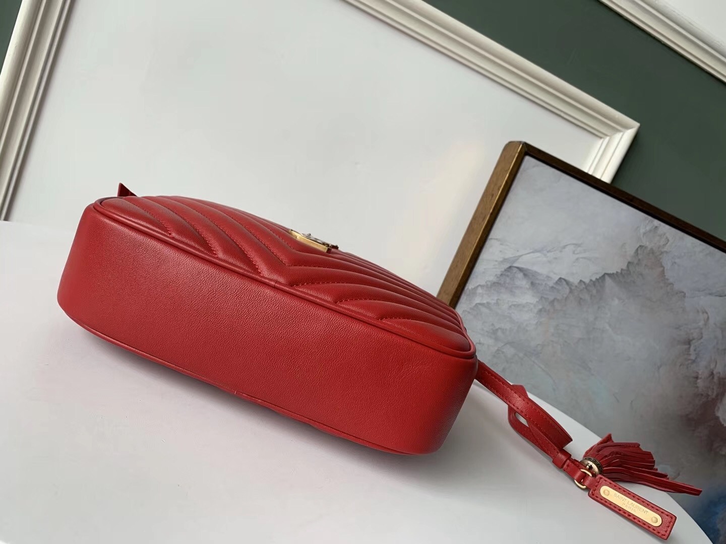 Sa**t Lau*nt lou camera bag in red leather
