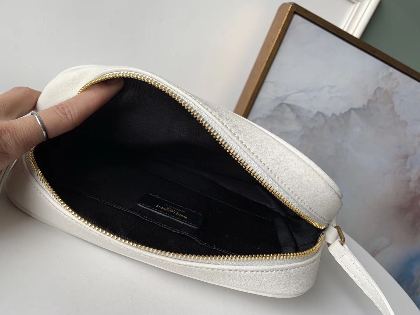Sa**t Lau*nt lou camera bag in white leather