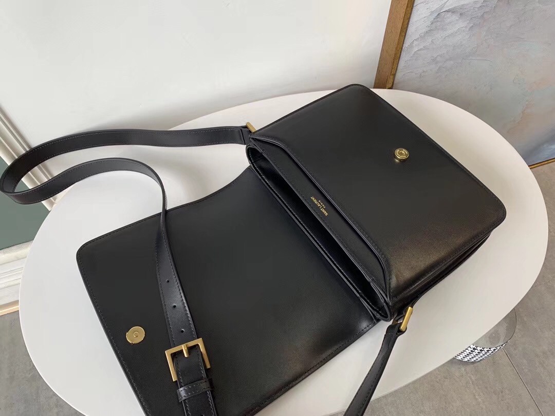 Sa**t Lau*nt le 61 medium saddle bag in black leather