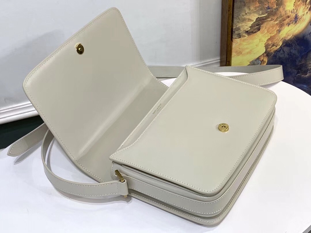 Sa**t Lau*nt le 61 medium saddle bag in white leather