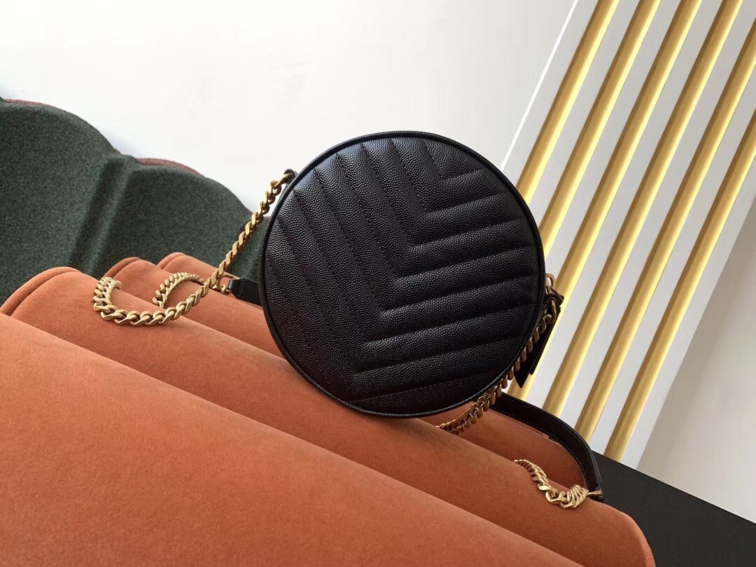 Sa**t Lau*nt vinyle round camera bag in black grained leather