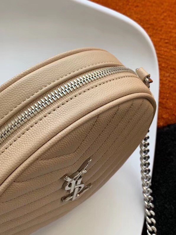 Sa**t Lau*nt vinyle round camera bag in beige grained leather